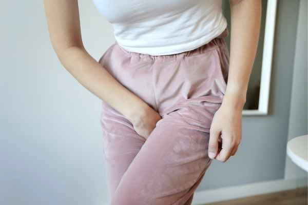 woman struggling with urine incontinence Corby